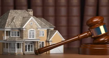 house-with-gavel-and-law-books-real-estate-law-a-2026-01-08-06-31-09-utc 1