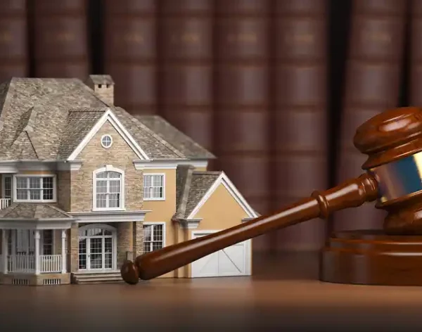 house-with-gavel-and-law-books-real-estate-law-a-2026-01-08-06-31-09-utc 1