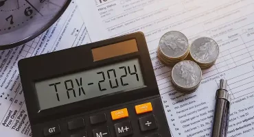tax-preparation-with-calculator-clock-and-form-2026-01-07-01-27-06-utc 1 (1)