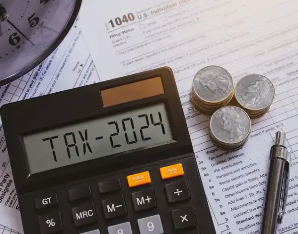 tax-preparation-with-calculator-clock-and-form-2026-01-07-01-27-06-utc 1 (1)